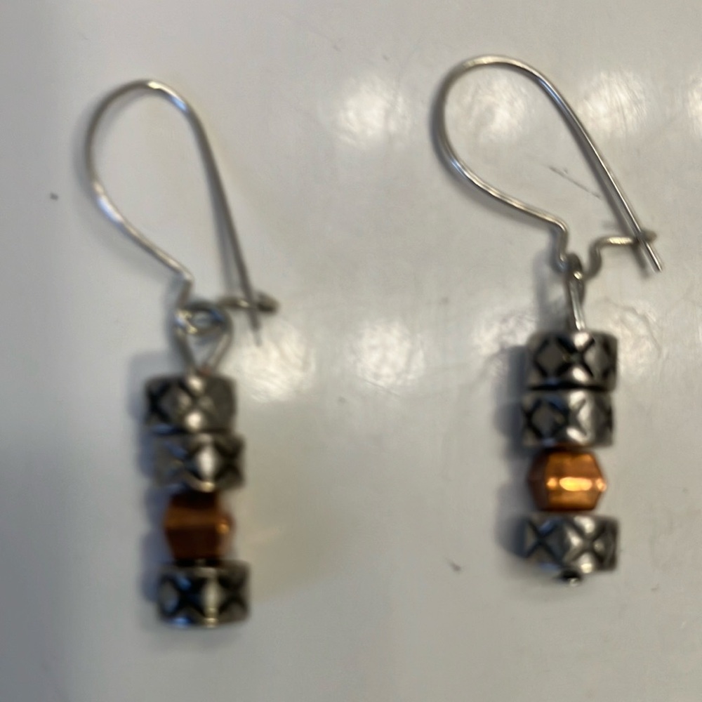 Silver and copper metal beads earrings on sterling silver ear wire.